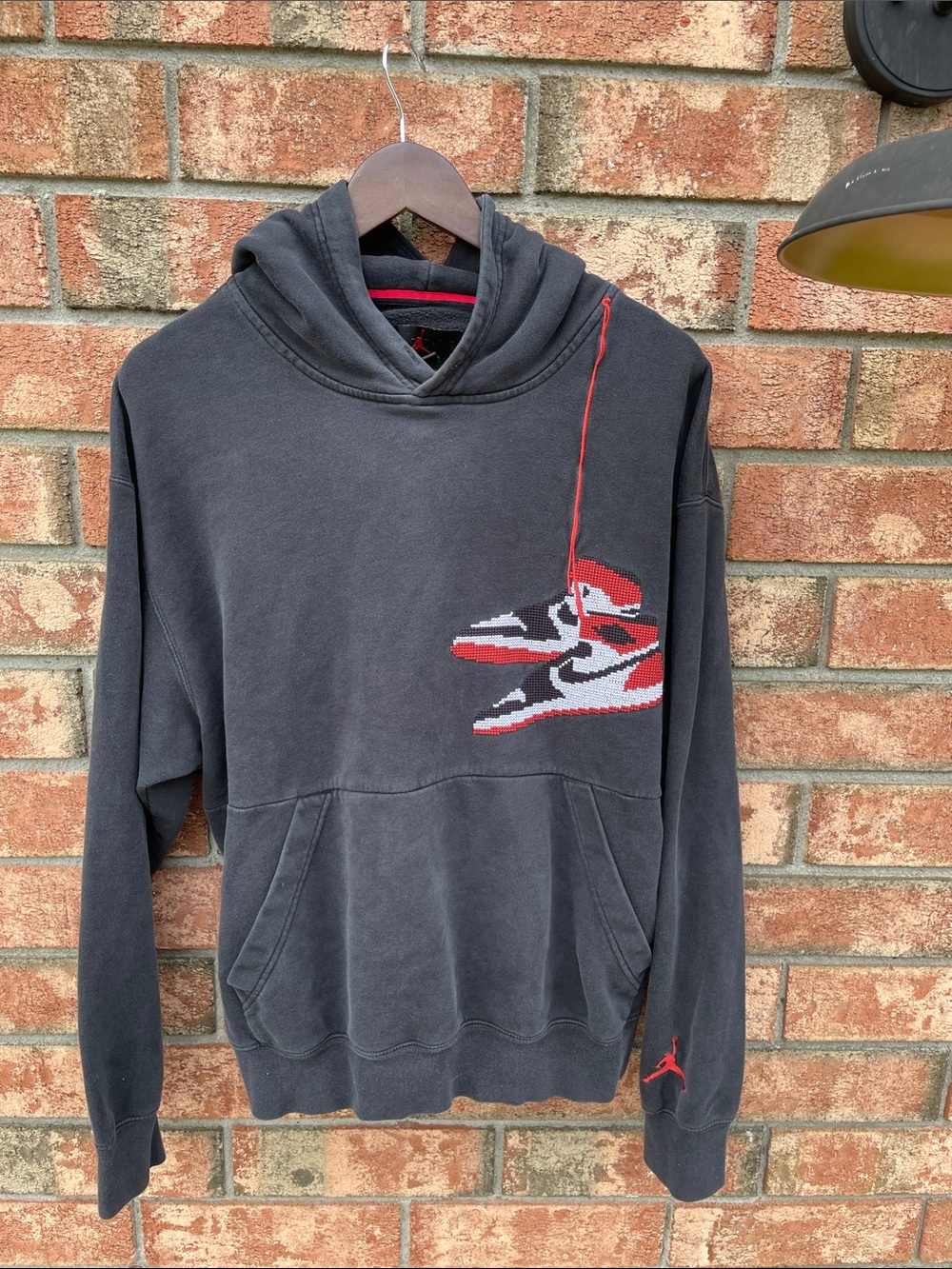 Jordan Black Pullover Hoodie with Red & White Sneaker Motif